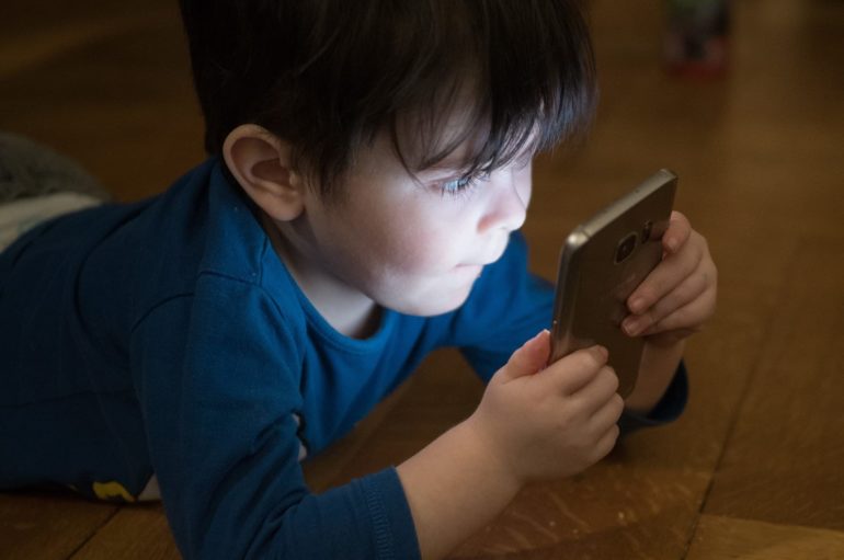 The Best Mobile Apps in 2018 to Keep Your Kids Engaged Boy Playing Mobile Games