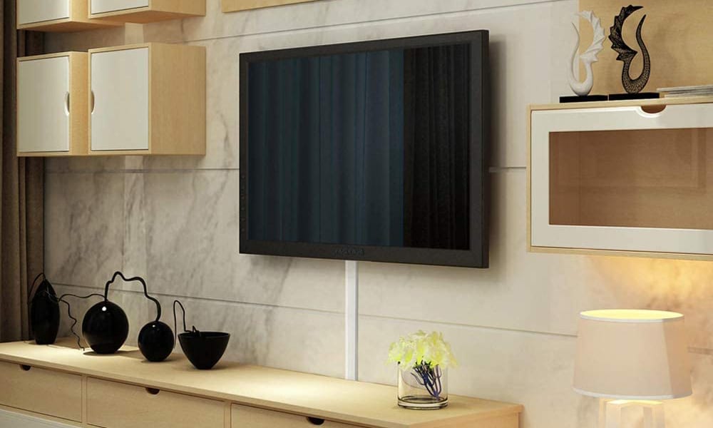 How To Hide Your Tv Wires Without Cutting Into Walls The Plug Hellotech - Wall Mounted Tv Cover Ups