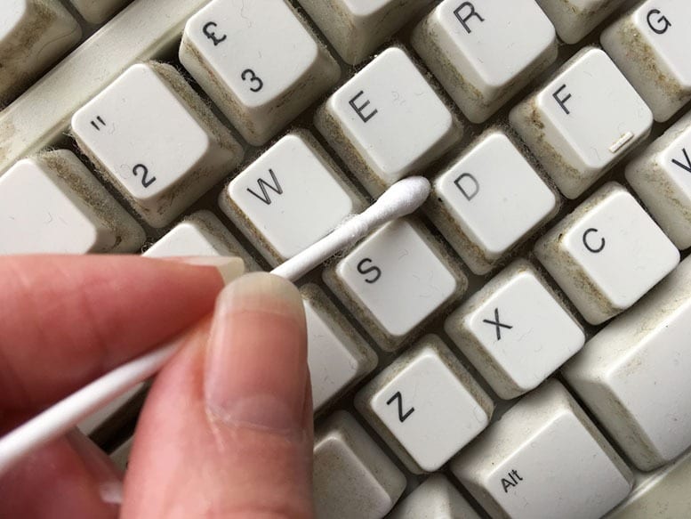 how to clean a computer keyboard with cotton swabs